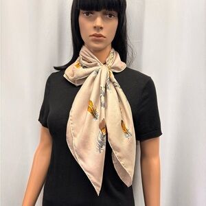 Cream and Gold Silky Scarf with Dog and Feather Pattern